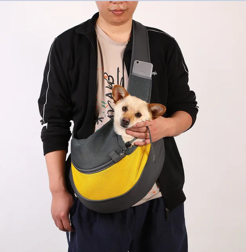 "Ultimate Pet Travel Companion: Portable Breathable Pet Carrier Bag with Adjustable Strap and Mesh Design"